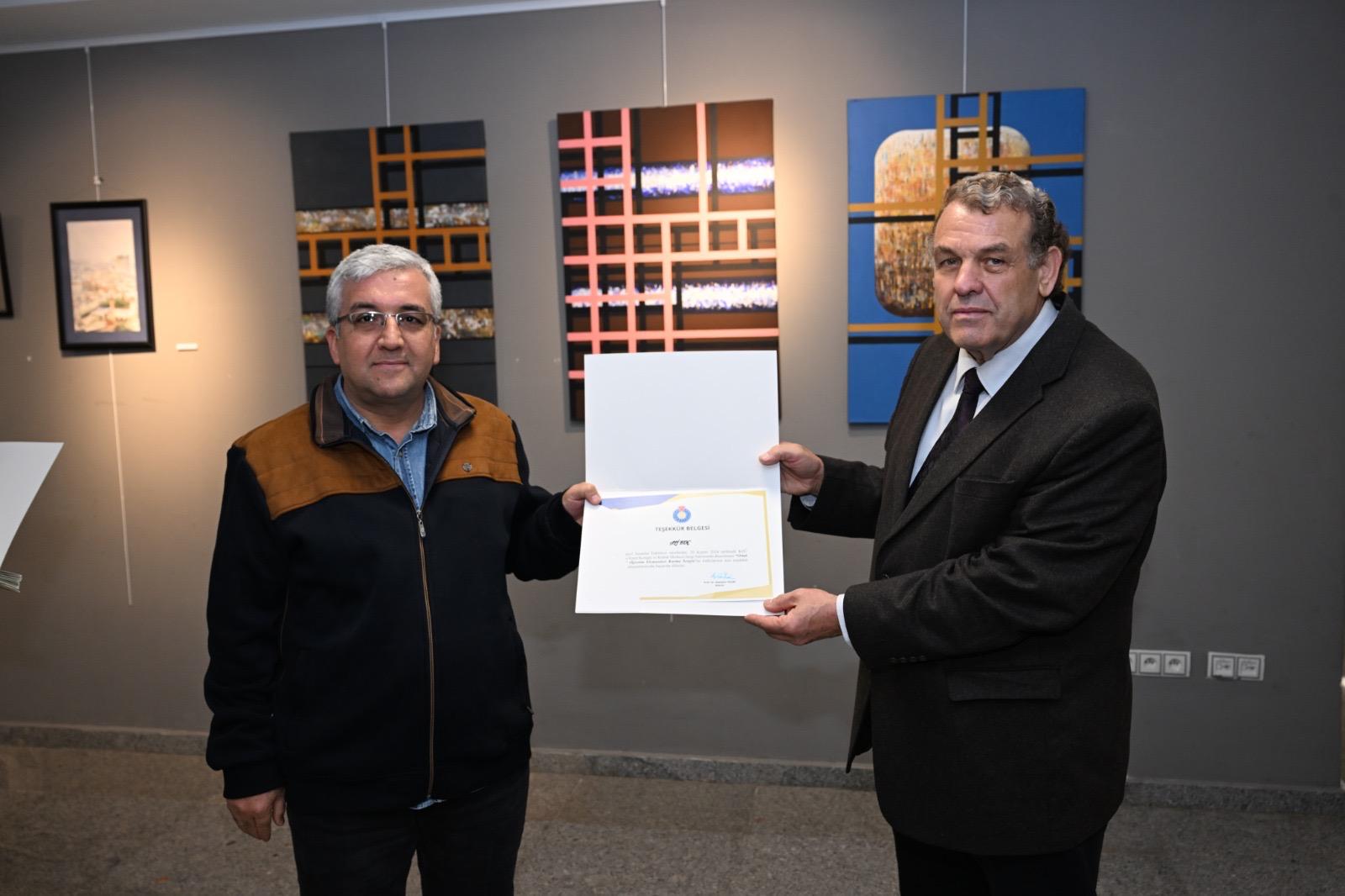 “Ortak Alan” Öğretim Elemanları Karma Sergisi sanatseverlerin yoğun ilgisi ile açıldı.